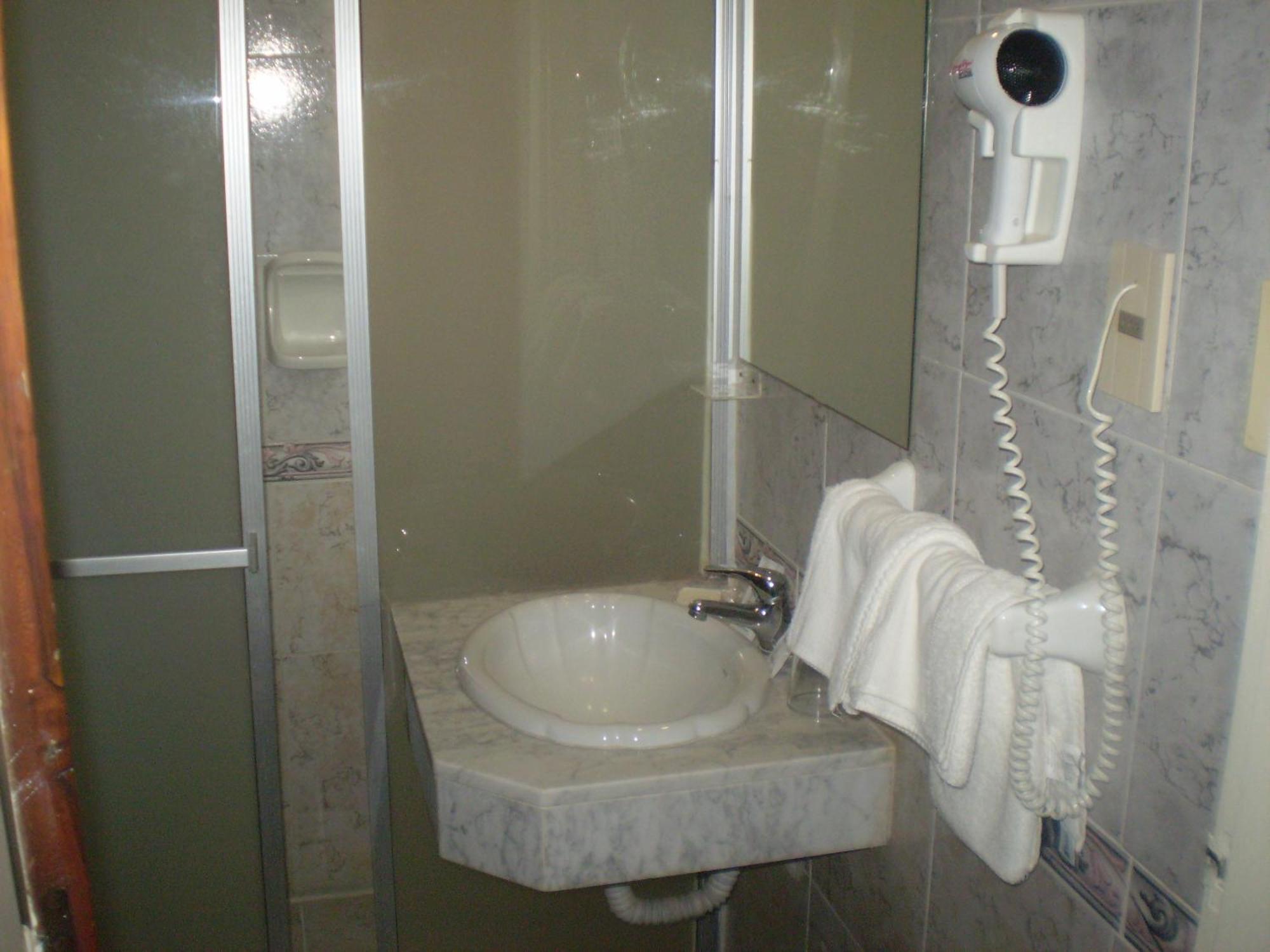 Hotel Centenario Atlántida Pokoj fotografie