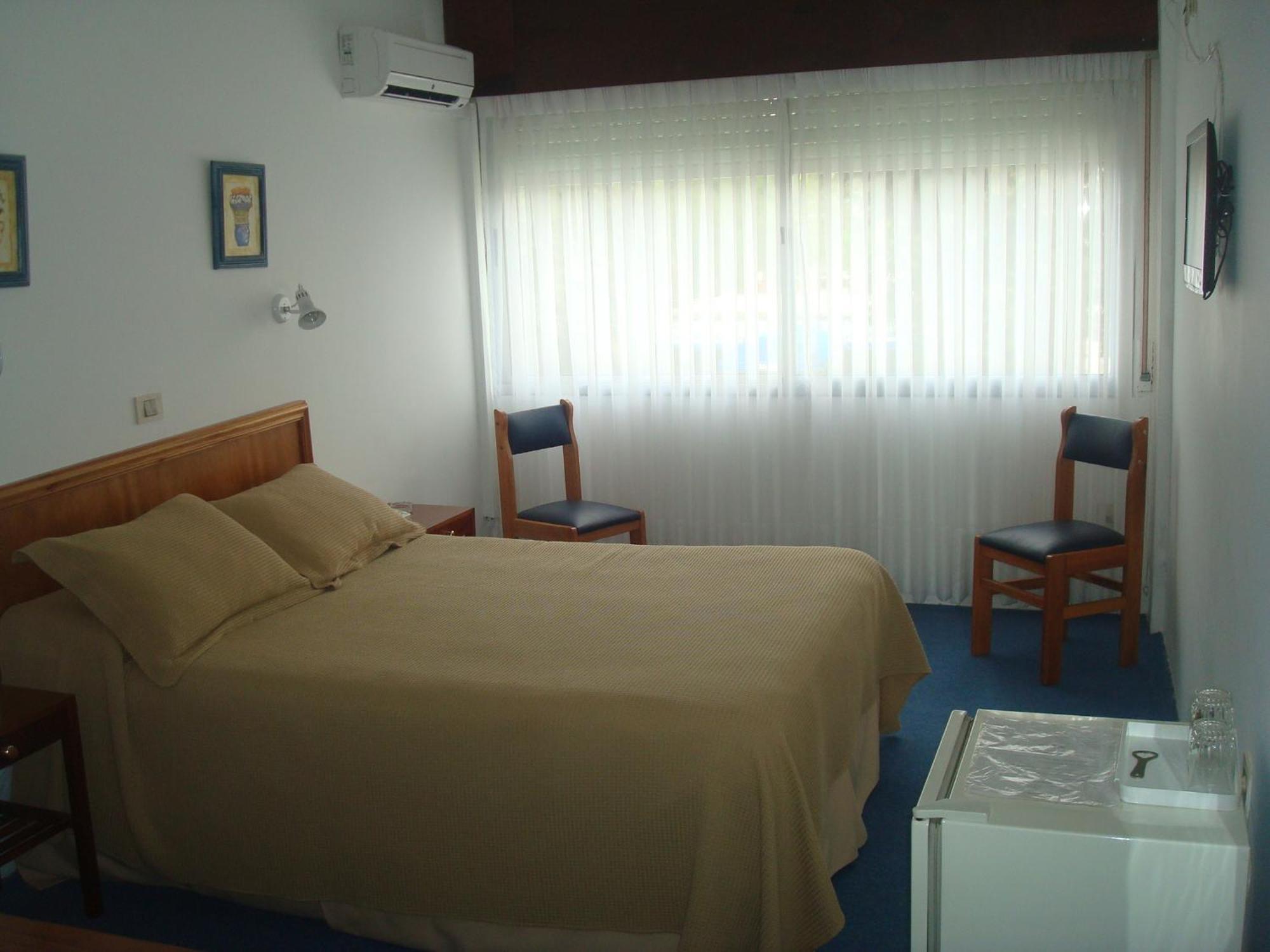 Hotel Centenario Atlántida Pokoj fotografie